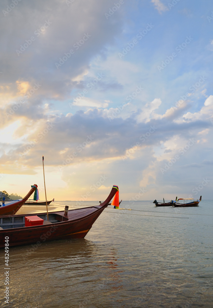 Boats in evening in Kamala bay in Thailand island Boats in evening in Kamala bay in Thailand island