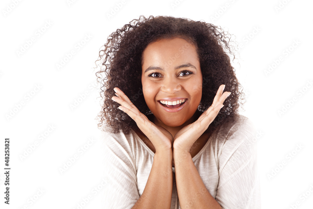 Surprised young african woman with hands over her mouth Surprised young african woman with hands over her mouth