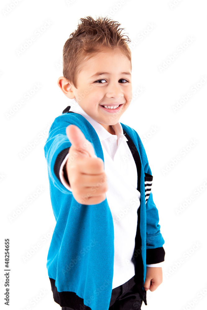 Adorable kid doing thumbs up over white background Adorable kid doing thumbs up over white background
