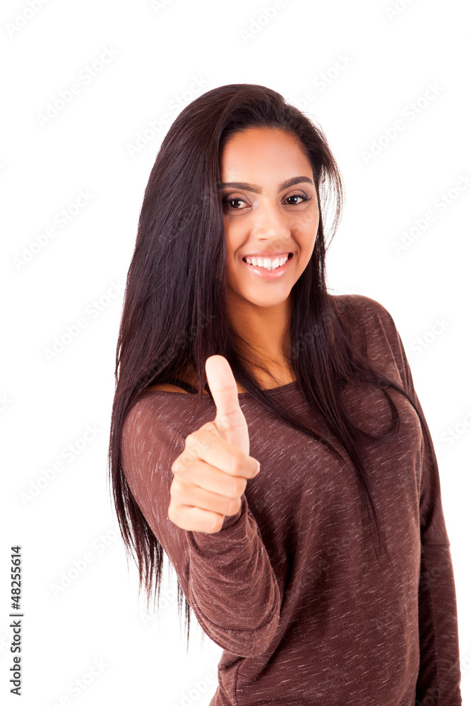 Beautiful mix race woman showing thumbs up over white background