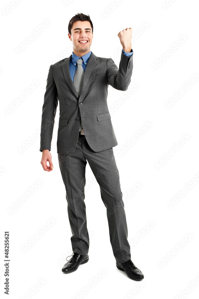 Businessman raising arms in sign of victory. Businessman raising arms in sign of victory.