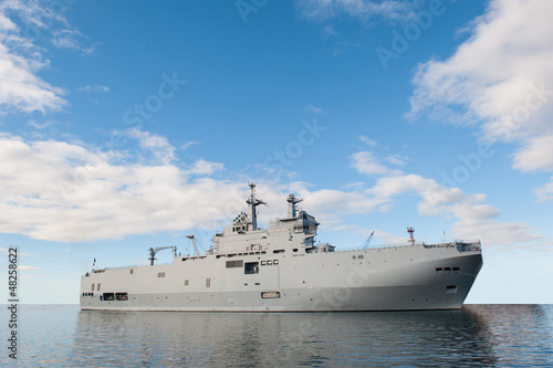 Military ship and blue sky.