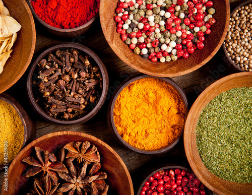 Fototapeta Naklejka Na Ścianę i Meble -  Various kind of spices in wooden bowls