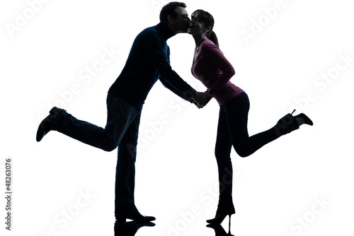 couple woman man lovers kissing silhouette