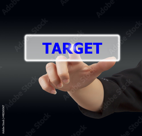 woman hand touching button target