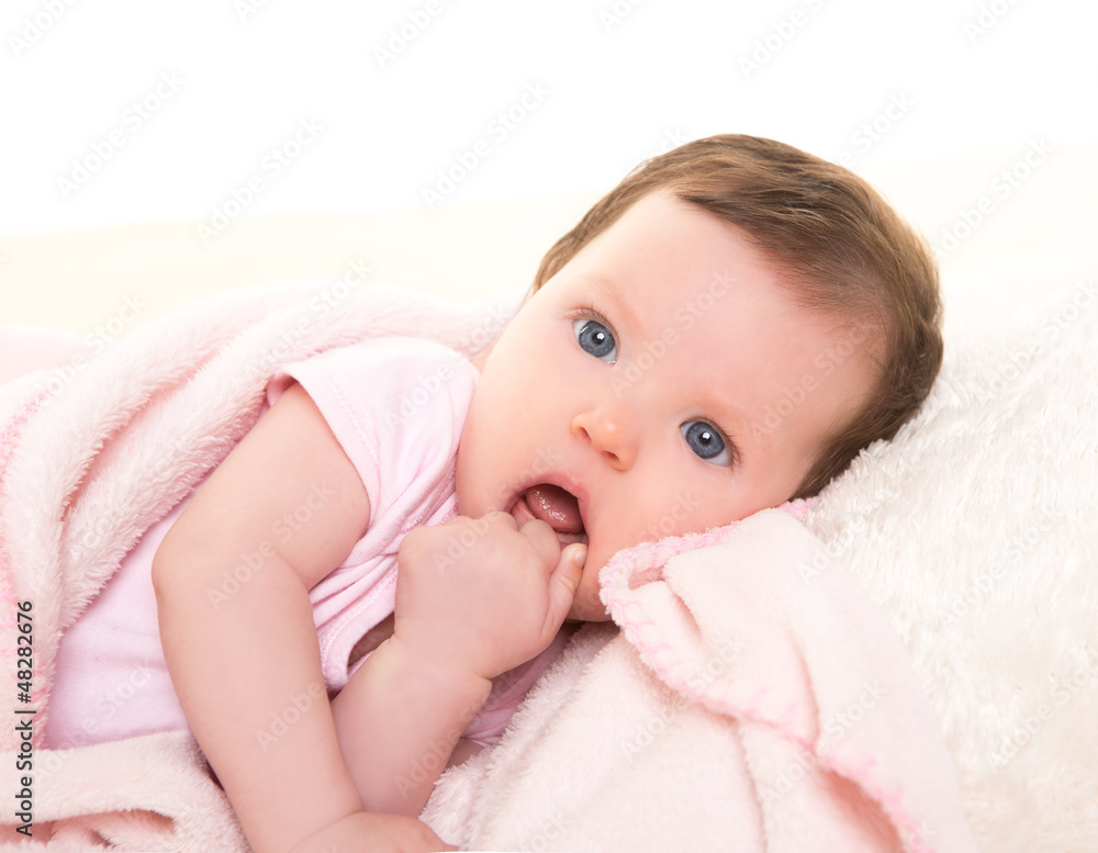 baby girl with toothache in pink with white fur baby girl with toothache in pink with white fur
