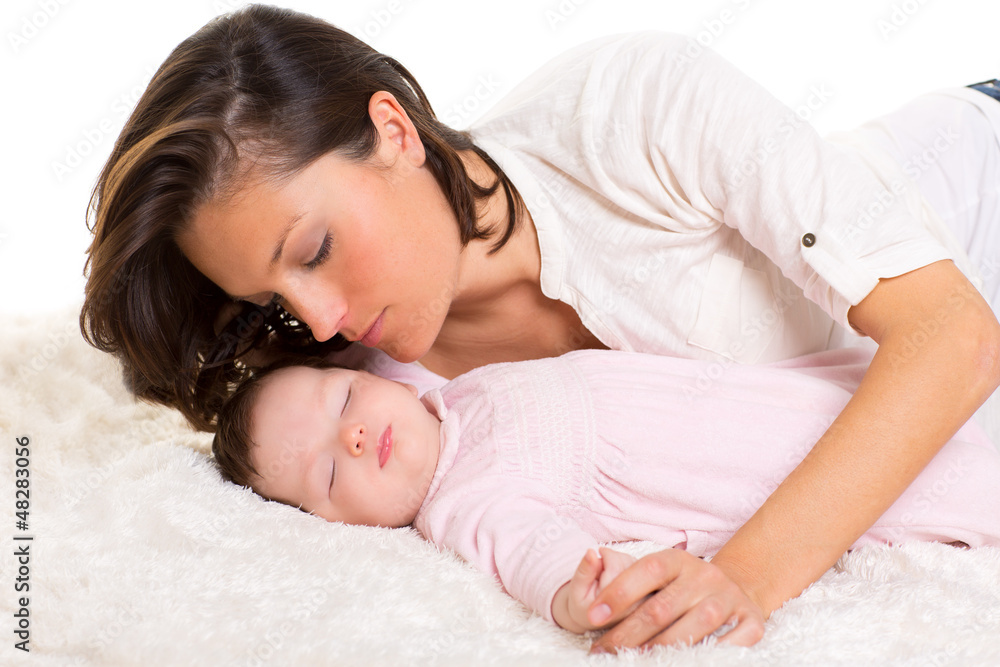 Baby girl sleeping with mother care near Baby girl sleeping with mother care near
