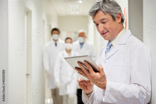 Doctor Holding Digital Tablet