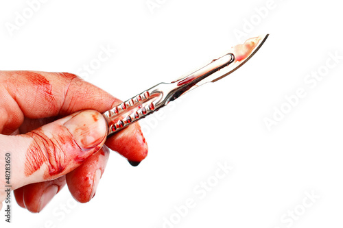 Fototapeta Bloody surgeon scalpel and hand , isolated