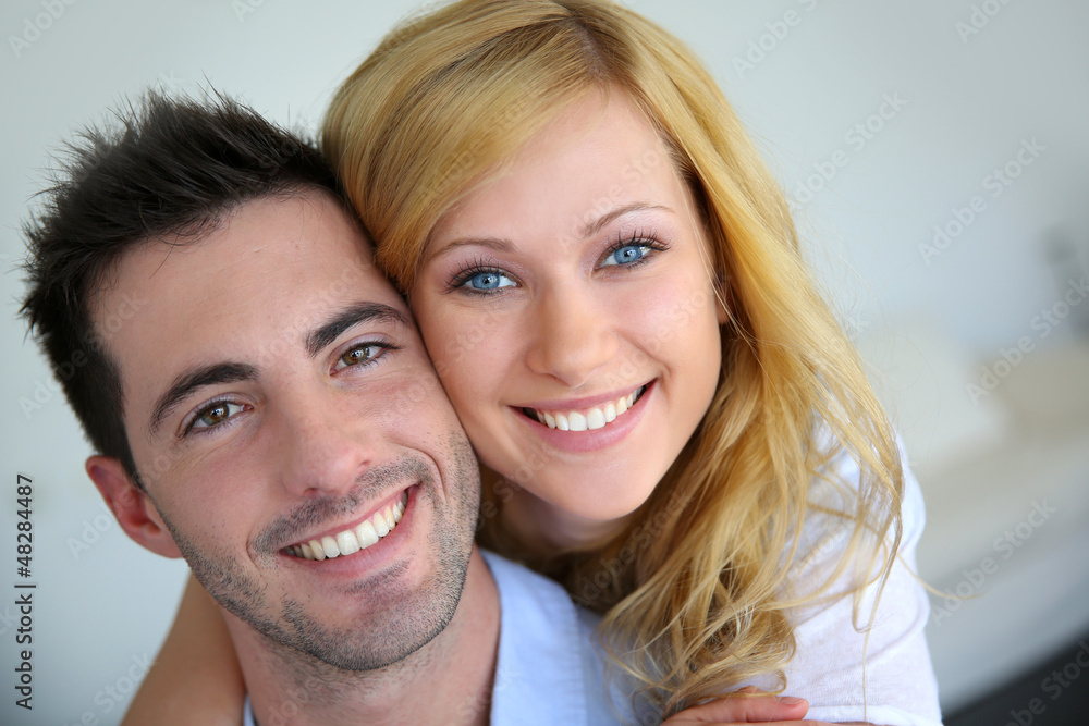 Cheerful in love couple at home