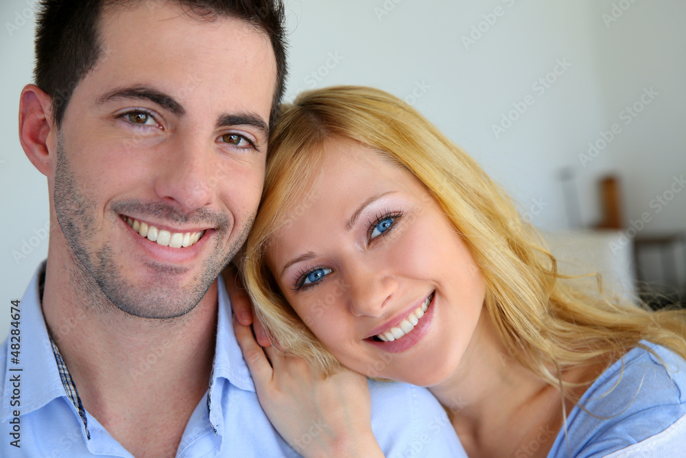 Cheerful in love couple at home Cheerful in love couple at home