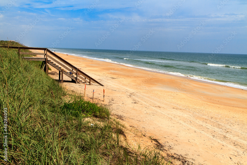 Florida beach with wooden ocean access