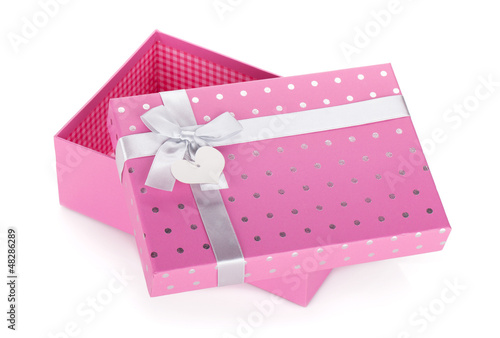 Opened pink gift box with ribbon and bow