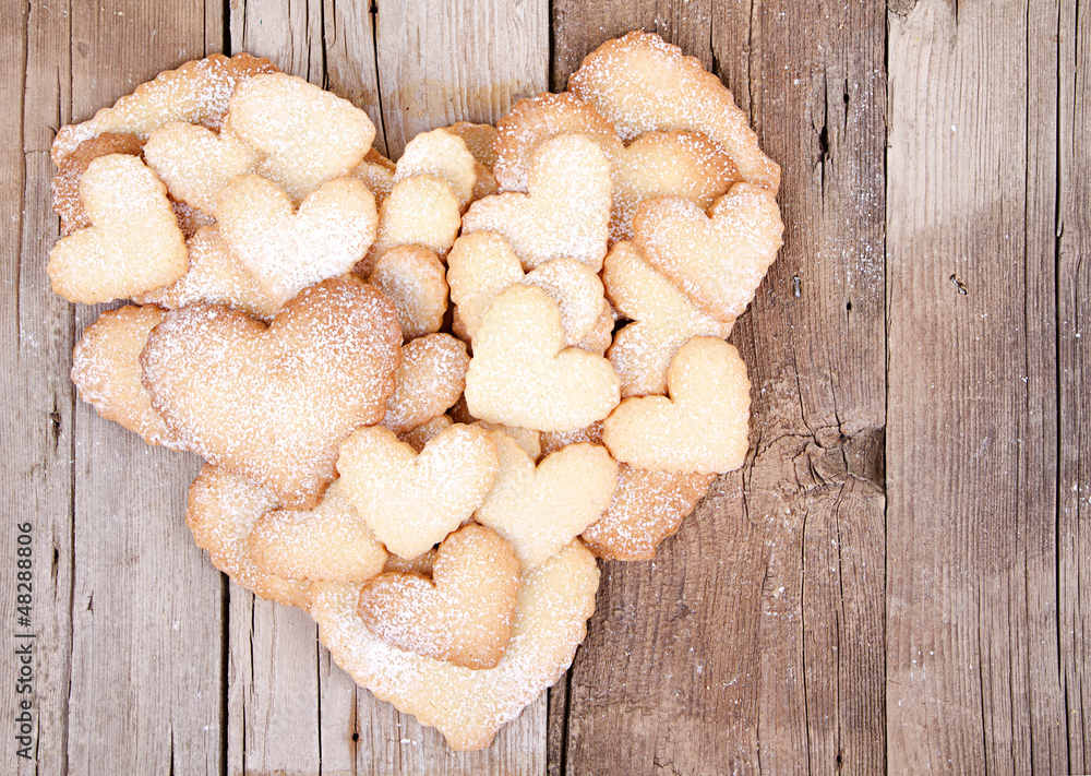 Fototapeta premium Many sugar cookies stacked in heart shape
