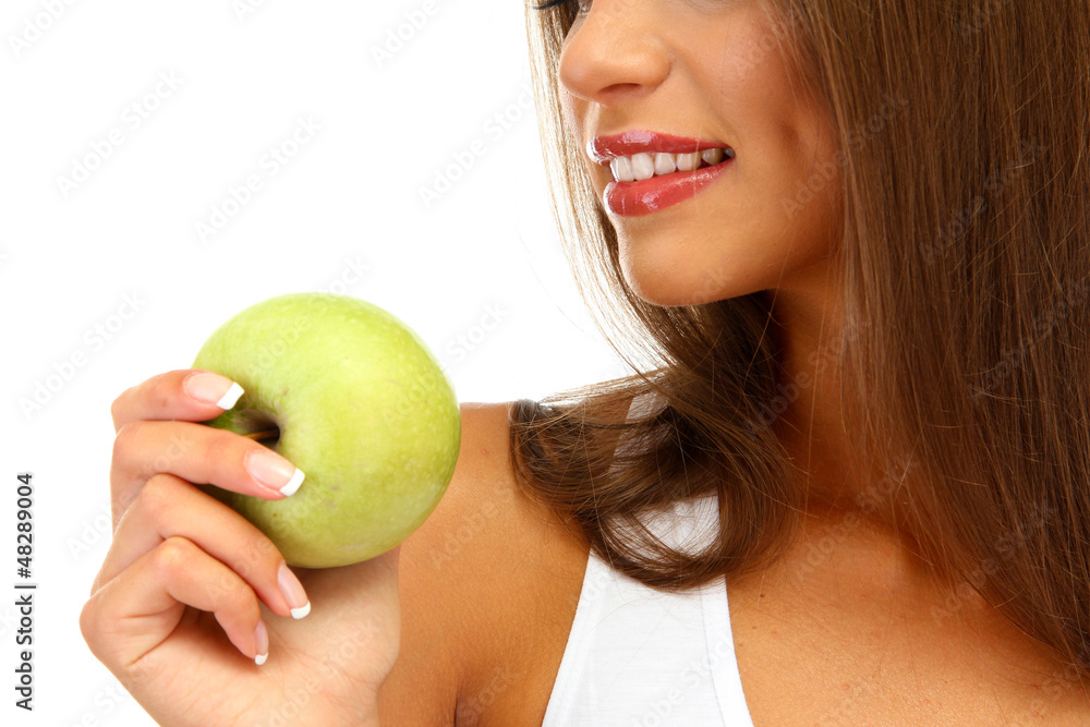 beautiful young woman with green apple, isolated on white beautiful young woman with green apple, isolated on white