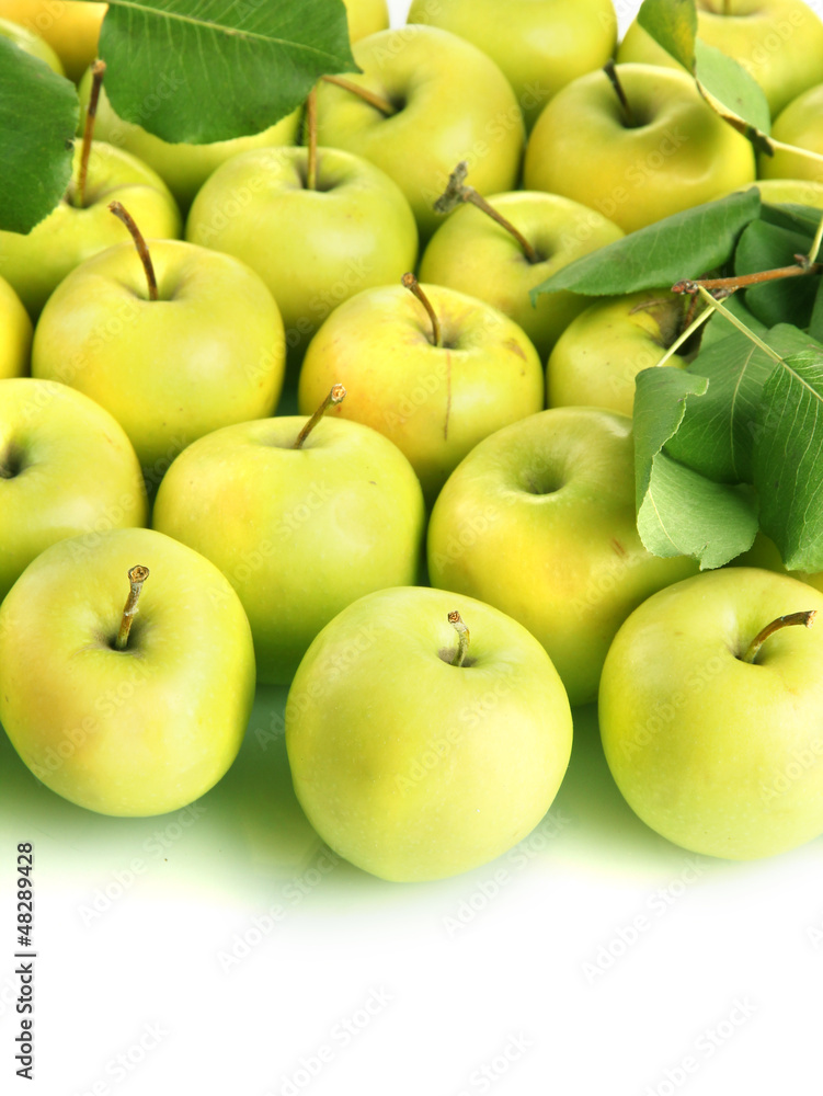 juicy apples with green leaves, isolated on white juicy apples with green leaves, isolated on white