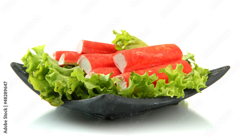 Crab sticks with lettuce leaves and lemon Crab sticks with lettuce leaves and lemon