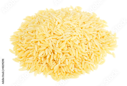 Heap of orzo pasta isolated on white background