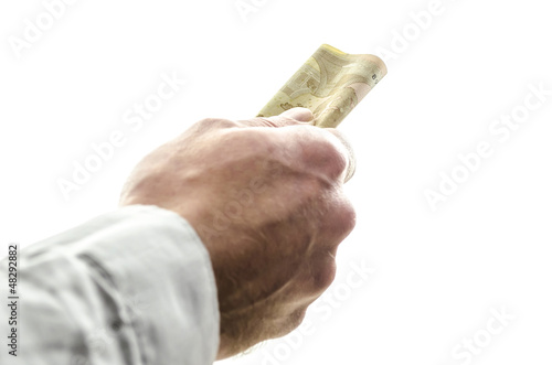 Male hand giving money