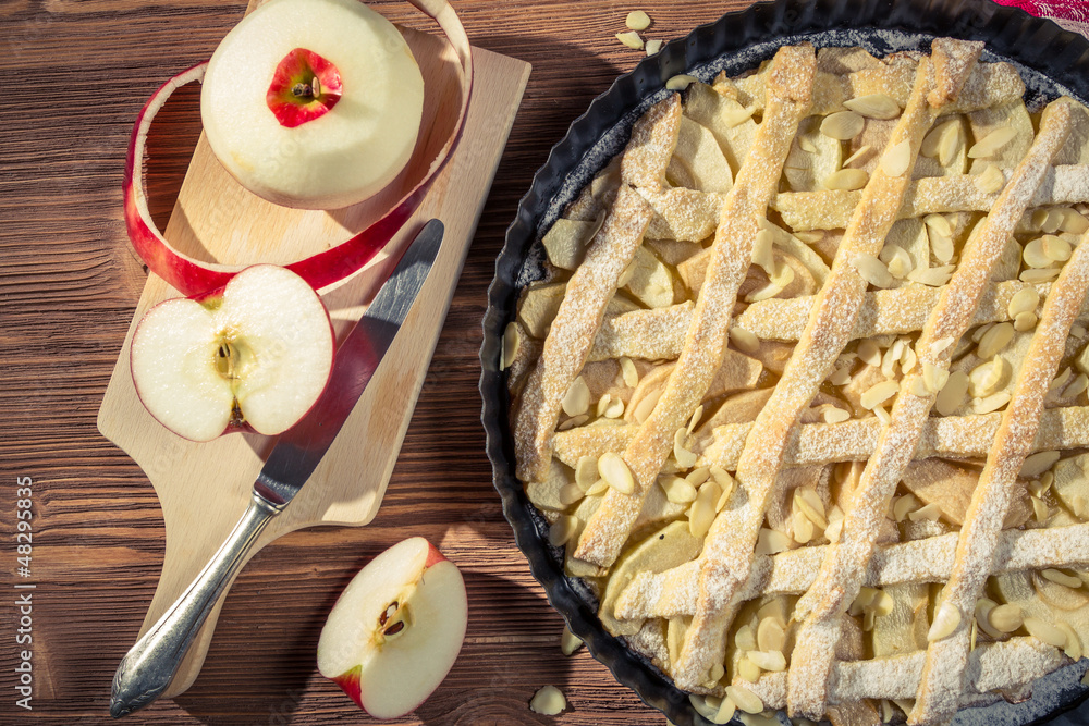 Freshly peeled apples and apple pie Freshly peeled apples and apple pie