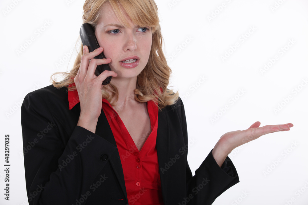 Blond having telephone dispute