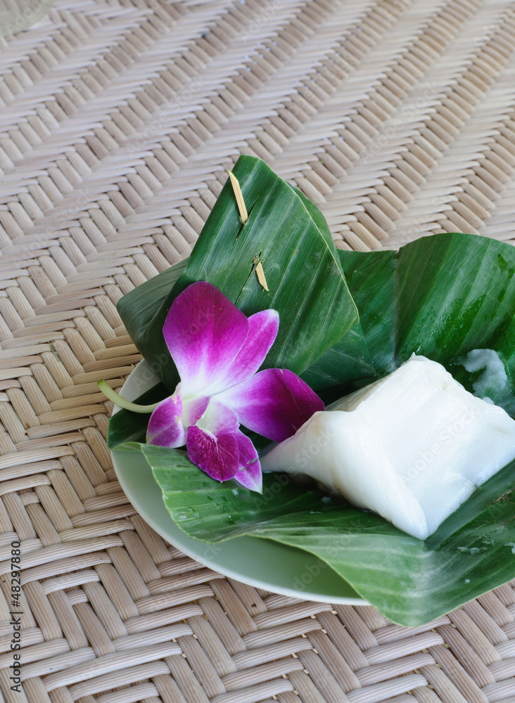 Thai dessert. Coconut milk and Steamed rice dough with sweet coc Thai dessert. Coconut milk and Steamed rice dough with sweet coc