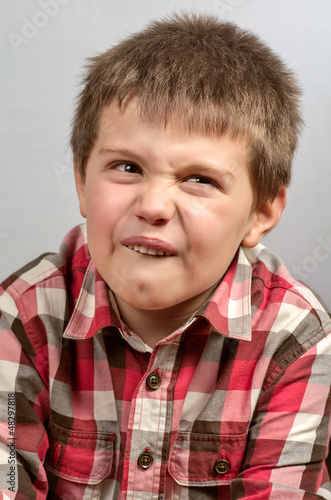 child making ugly faces 7