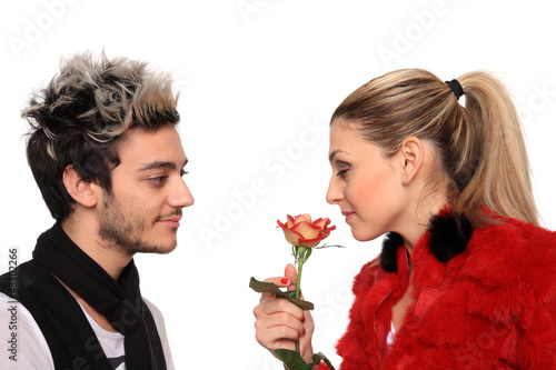 beautiful young couple with a rose