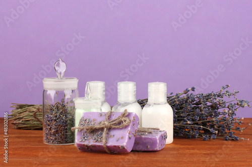 Fototapeta Naklejka Na Ścianę i Meble -  ingredients for soap making on violet background
