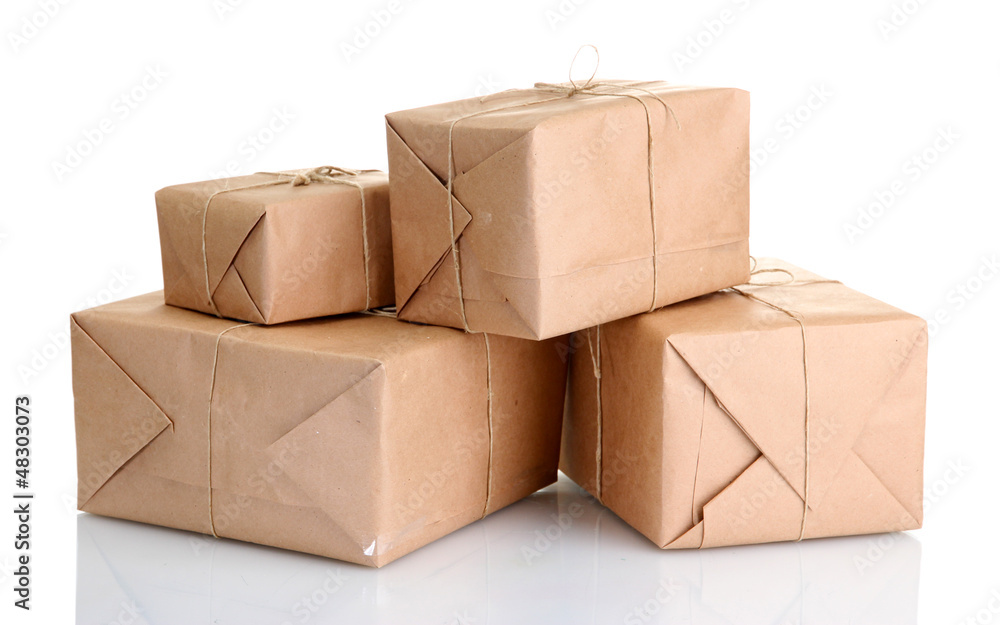 parcels boxes with kraft paper, isolated on white parcels boxes with kraft paper, isolated on white