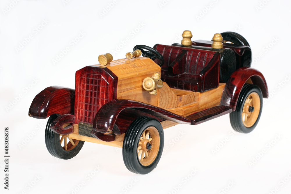 Wooden retro car isolated on white background