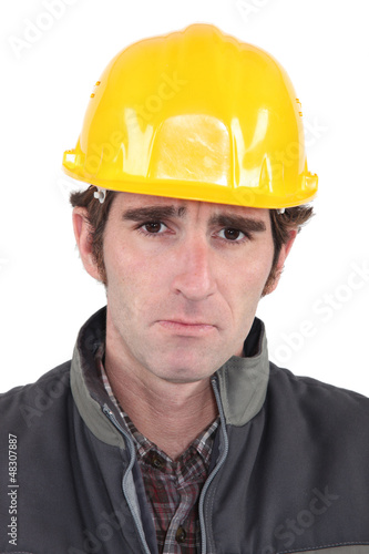 Builder looking upset