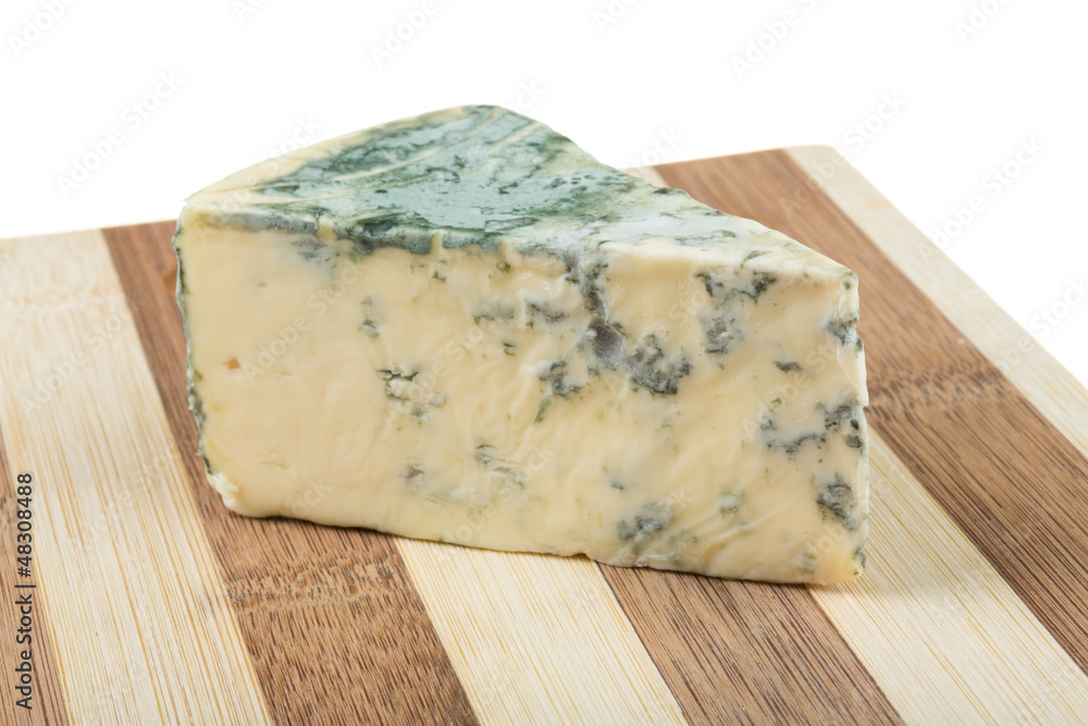 Wedge of soft blue cheese, isolated on white Wedge of soft blue cheese, isolated on white