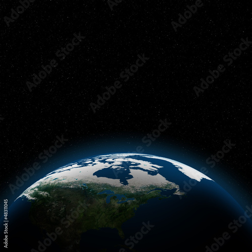 Fototapeta Naklejka Na Ścianę i Meble -  Planet earth with sun rising over North of America (Elements of