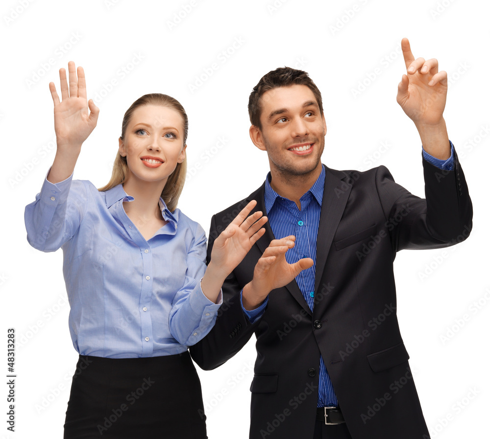 man and woman working with something imaginary