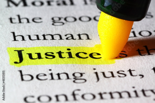 Word justice highlighted with a yellow marker