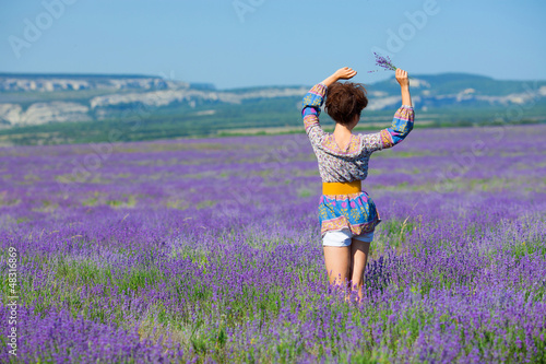 Fototapeta Naklejka Na Ścianę i Meble -  Girl on lavender field