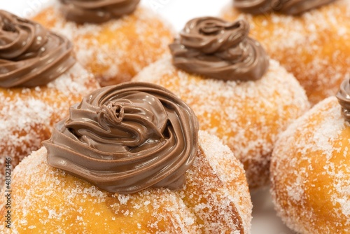 Krapfen with chocolate photo