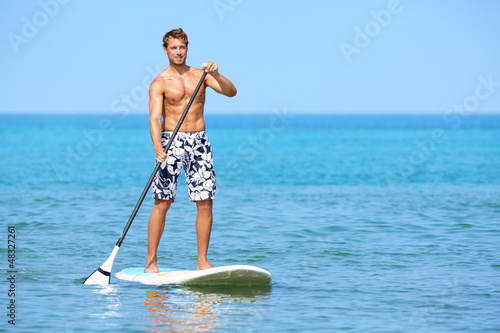 Stand up paddle board man paddleboarding photo