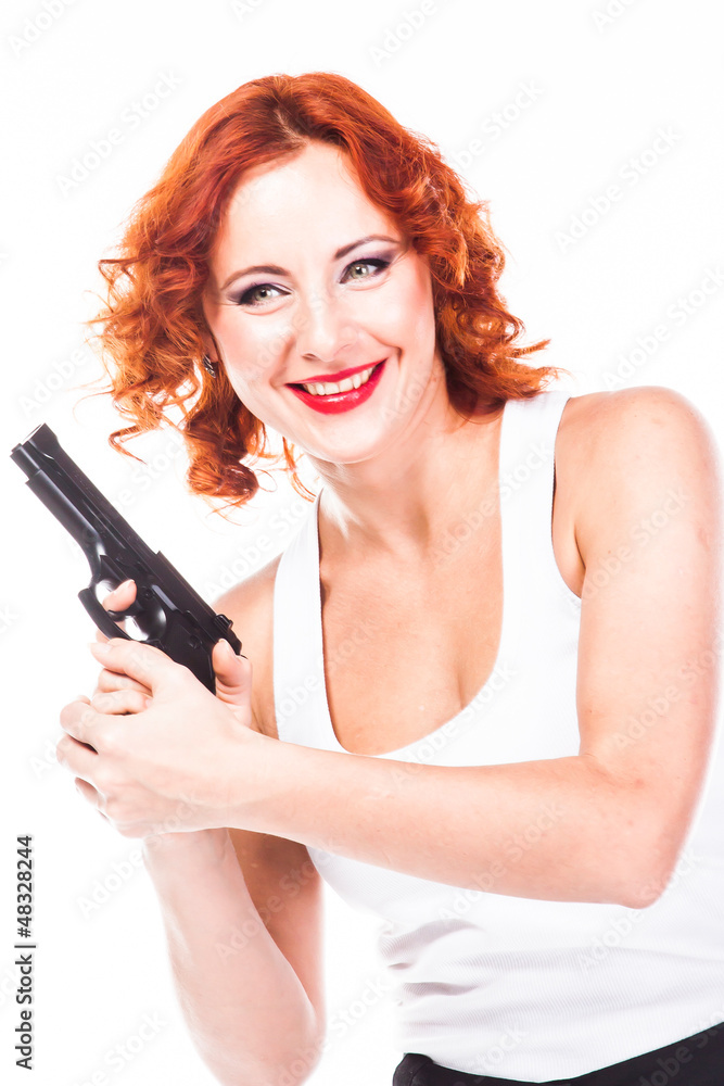 Young and beautiful woman with a gun Young and beautiful woman with a gun