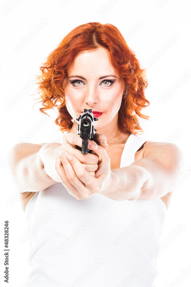 Young and beautiful woman with a gun Young and beautiful woman with a gun