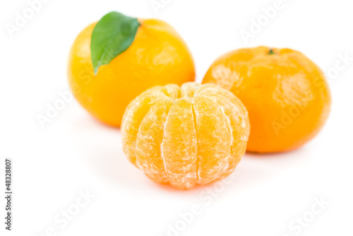 Ripe tasty tangerines isolated on white