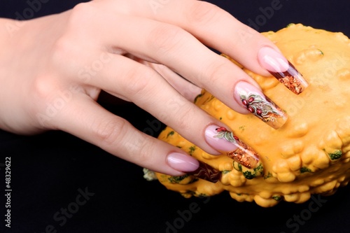 Square shaped hand nails with rose hip