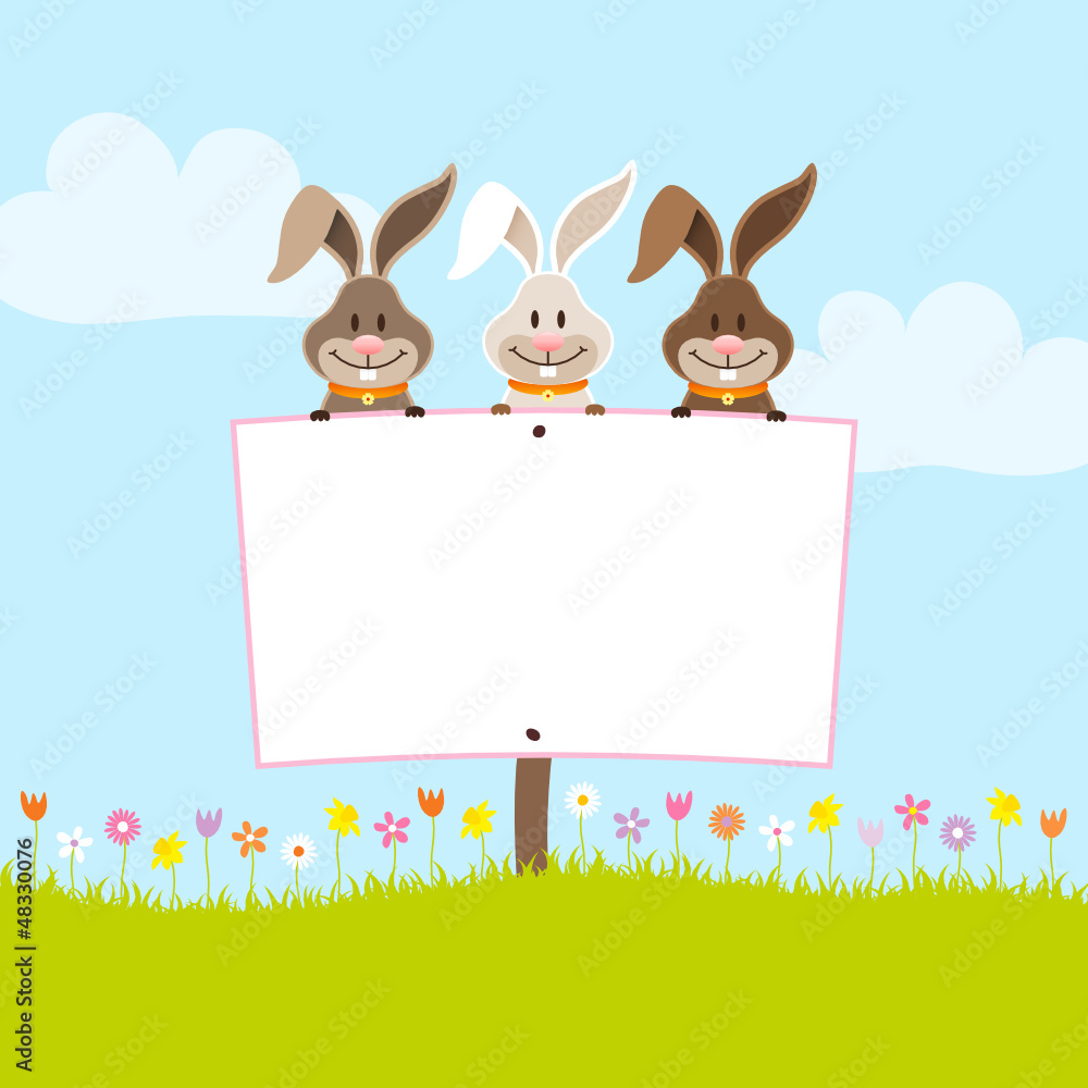 Fototapeta premium 3 Bunnies Holding Easter Egg Label In Meadow