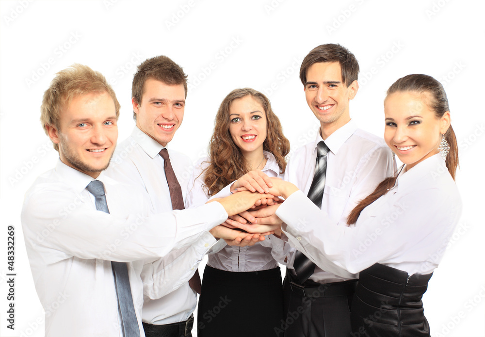 business team putting their hands on top business team putting their hands on top