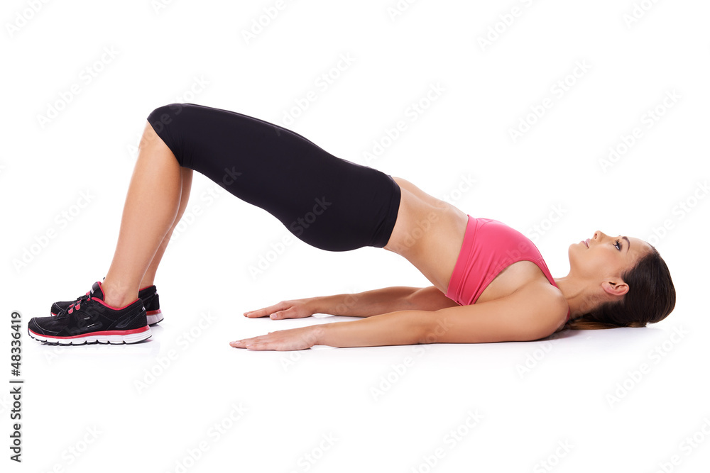 Fit woman doing exercises