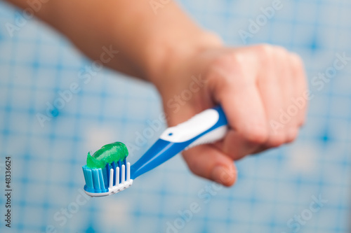 toothbrush in hand