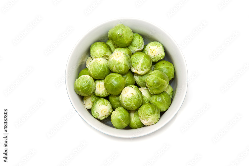 Brussel sprouts isolated on a white studio background. Brussel sprouts isolated on a white studio background.