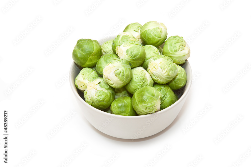 brussel sprouts isolated on a white studio background. brussel sprouts isolated on a white studio background.