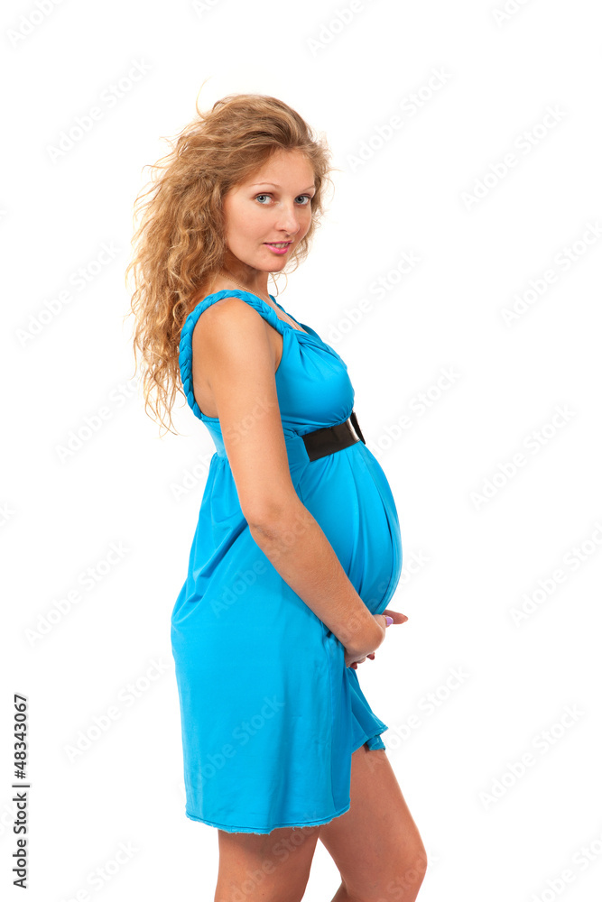 Pregnant woman is caressing her belly Pregnant woman is caressing her belly
